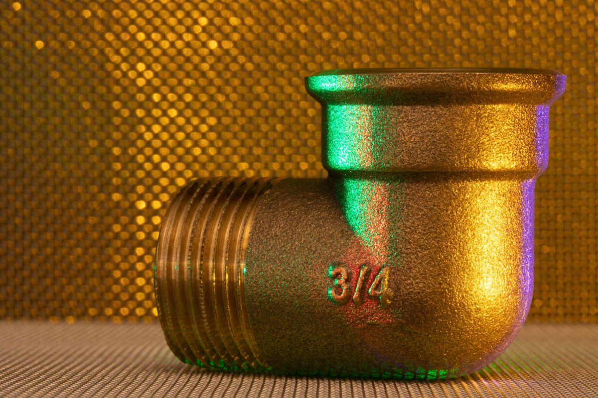 Brass 3/4 inch elbow fitting with threaded connection