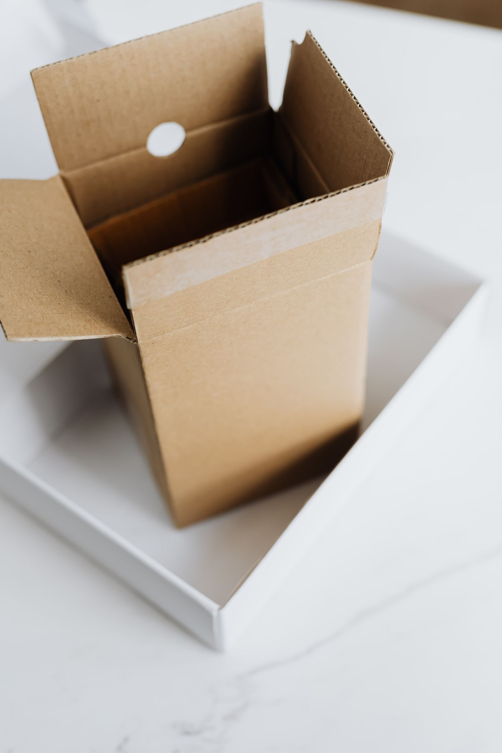 A packed cardboard carton prepared for dispatch